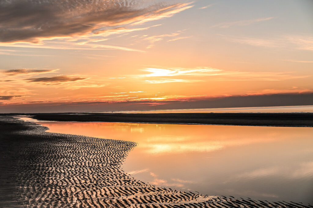 Zonsondergang tijdens je vakantie op de Waddeneilanden