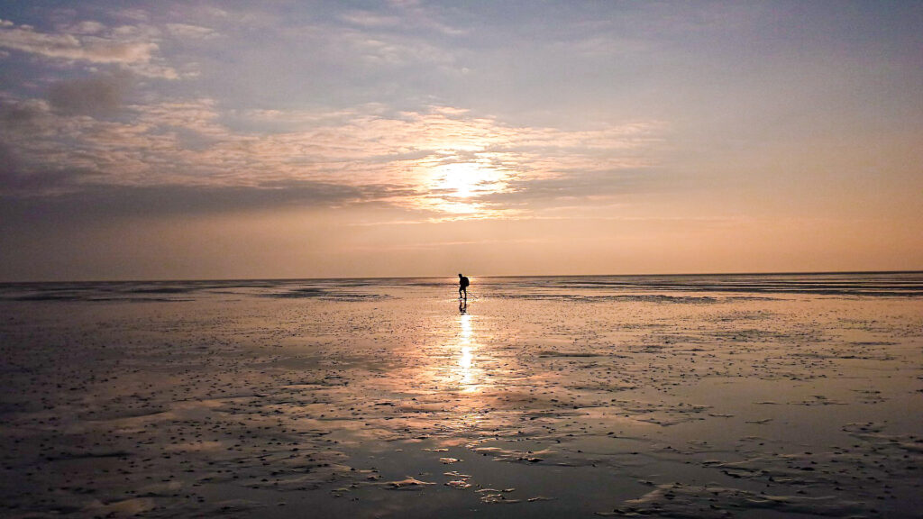 Zonsondergang tijdens Wadlopen 